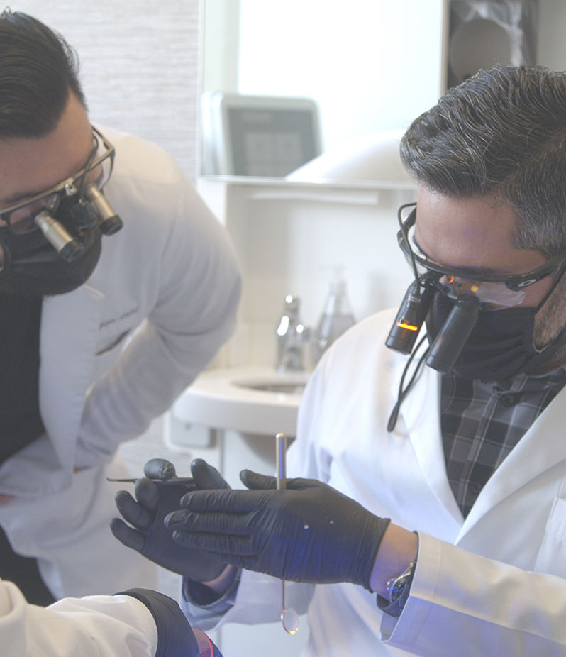 Dr. Matt Nejad is providing Biomimetic dentistry training to a student.